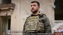 In this photo provided by the Ukrainian Presidential Press Office on Sunday, May 29, 2022, Ukrainian President Volodymyr Zelenskyy looks on as he visits the war-hit Kharkiv region. Volodymyr Zelenskyy described the situation in the east as indescribably difficult. The Russian army is trying to squeeze at least some result by concentrating its attacks there, he said in a Saturday night video address. (Ukrainian Presidential Press Office via AP)
