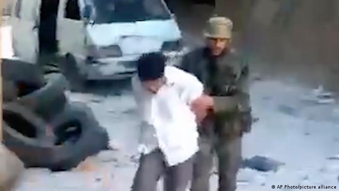 Кадър от видеото с масово убийство на цивилни в Тадамон