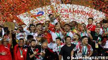 30.05.2022
Soccer Football - CAF Champions League - Final - Al-Ahly v Wydad Casablanca - Mohammed V Stadium, Casablanca, Morocco - May 30, 2022
Wydad Casablanca's Yahya Jabrane and teammates celebrate with the trophy after winning the CAF Champions League REUTERS/Juan Medina