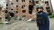 Президент Словакии Зузана Чапутова у разрушенного здания в Украине