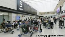 Photo taken on June 1, 2022, shows an arrival lobby for international flights at Narita airport in Chiba Prefecture, near Tokyo. Japan doubled its cap on daily arrivals to the country to 20,000 the same day as it continues to ease its strict border controls amid receding worries about the pandemic. (Kyodo)