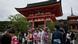 Tourists in front of a temple in Japan Tourists in front of a temple in Japan