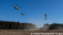 KAZLU RUDA, LITHUANIA - MARCH 01: US army Chinook helicopters taking off on March 1, 2022 in Kazlu Ruda, Lithuania. Saber Strike 2022 is an element of the large-scale exercise Defender-Europe 2022 military drills between U.S. troops and allied forces. (Photo by Paulius Peleckis/Getty Images)