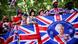 People gather along The Mall for the Queen's Platinum Jubilee celebrations in London People gather along The Mall for the Queen's Platinum Jubilee celebrations in London