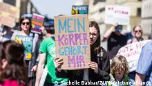 May 14, 2022, Munich, Bavaria, Germany: Reacting to the leak via Politico of a draft opinion by Justice Samuel Alito to overturn Roe v. Wade (1973) and Planned Parenthood v. Casey (1992), Americans in Munich, Germany demonstrated in front of the American Consulate against what they see as attacks on their reproductive rights and bodily autonomy. The draft opinion ultimately leaves the decision to the states, meaning approximately 50% of the United states will implement some of all of the following: bans on abortion, criminalization of abortion, prerequisites that donÃ¢â¬â¢t coincide with the science, and hurdles so high, that abortion is effectively banned. Currently, 23 states are set to restrict abortion if Roe is overturned, with 13 states already having trigger bans in place. 16 states protect abortion rights. The Lancet has posed the rhetorical question Ã¢â¬ÅWhat kind of society has the USA become when a small group of Justices is allowed to harm women, their families, and their communities that they have been appointed to protect? (Credit Image: Â© Sachelle Babbar/ZUMA Press Wire