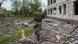 A soldier runs between ruins in the disputed and reclaimed villages between Mykolaiv and Kherson A soldier runs between ruins in the disputed and reclaimed villages between Mykolaiv and Kherson