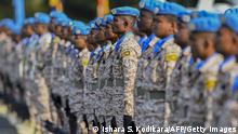 Sri Lankan troops march during a passing out parade before leaving for UN peacekeeping duties in Mali, at the Institute of Peace Support Operations Training centre in Kukuleganga, some 110 km south of Colombo on April 8, 2021. (Photo by ISHARA S. KODIKARA / AFP) (Photo by ISHARA S. KODIKARA/AFP via Getty Images)