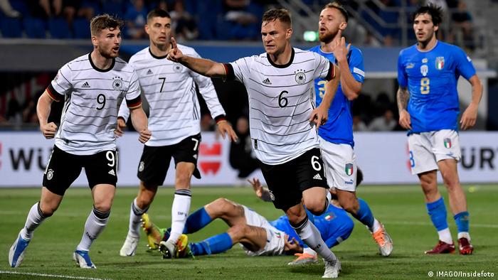Joshua Kimmich of Germany celebrates after scoring the goal of 1-1 during the Uefa Nations League group 3 football match between Italy and Germany 