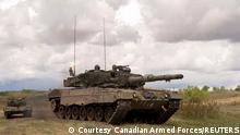 FILE PHOTO: Leopard 2A4 tanks from the Royal Canadian Dragoons, C Squadron travel in the Wainwright Garrison training area during Exercise MAPLE RESOLVE in Wainwright, Alberta, Canada on May 15, 2017. JF Lauzé/Courtesy Canadian Armed Forces via REUTERS/File Photo
