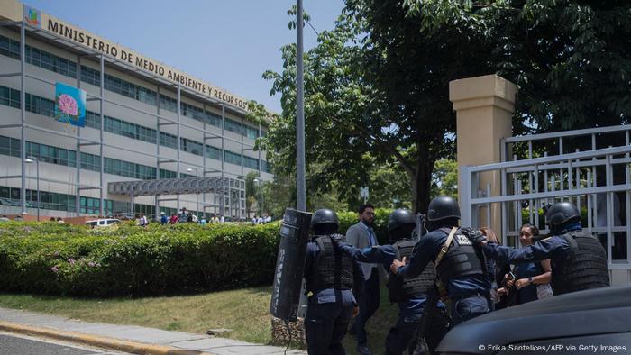 Police are deployed at the Dominican Ministry of Environment headquarters during a shooting, in Santo Domingo, June 6, 2022.