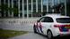A police car waits outside the court in Amsterdam A police car waits outside the court in Amsterdam