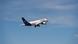 A Lufthansa plane takes off A Lufthansa plane takes off