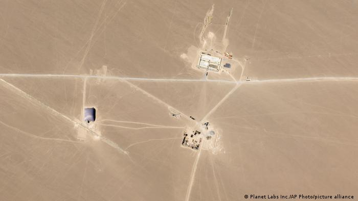 satellite image showing buildings in a desert