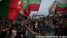 SOFIA, BULGARIA - SEPTEMBER 10: People wave the Bulgarian national flag and blow whistles during anti government protest on September 10, 2020 in Sofia, Bulgaria. For weeks now thousands of people have been taking part in daily protests against corruption, demanding the resignation of the government of Boyko Borissov, in power since 2009. (Photo by Hristo Rusev/Getty Images)