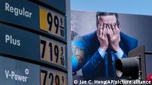FILE - Gas prices are seen in front of a billboard advertising HBO's Last Week Tonight in Los Angeles, March 7, 2022. Three oil regimes that President Joe Biden and past U.S. leaders have snubbed — Venezuela, Saudi Arabia and Iran — are the targets of U.S. outreach as global fuel prices hit record highs during the Ukraine crisis. But it’s not clear any U.S. diplomacy could get more crude on the market fast enough to help the current supply crunch. (AP Photo/Jae C. Hong, File)
