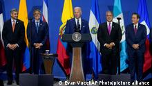 President Joe Biden, center, speaks beside Ecuador President Guillermo Lasso, center left, and Colombian President Iván Duque, center right, during a meeting on migration at the Summit of the Americas, Friday, June 10, 2022, in Los Angeles. (AP Photo/Evan Vucci)