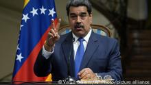 Venezuela's President Nicolas Maduro gestures as he speaks in a joint news briefing with his Iranian counterpart Ebrahim Raisi at the Saadabad Palace in Tehran, Iran, Saturday, June 11, 2022. (AP Photo/Vahid Salemi)