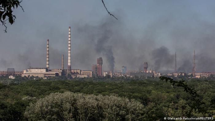 Smoke rises after a military strike on a compound of Sievierodonetsk's Azot Chemical Plant