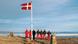Danish soldiers in orange and camouflage after they raised the Danish flag on Hans Island Danish soldiers in orange and camouflage after they raised the Danish flag on Hans Island