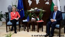 President of the European Commission Ursula von der Leyen meets with Palestinian Prime Minister Mohammad Shtayyeh, in Ramallah West Bank, Tuesday, June 14, 2022. Von der Leyen is on a two-day official visit to Israel and the Palestinian territories. (Atef Safadi/Pool via AP)