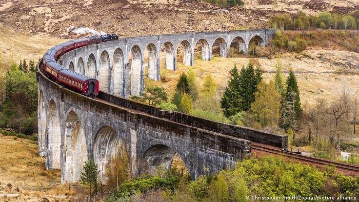 The Jacobite steam train crosses a viaduct