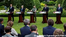 French President Emmanuel Macron, German Chancellor Olaf Scholz, Italian Prime Minister Mario Draghi, Romanian President Klaus Iohannis and Ukrainian President Volodymyr Zelenskiy attend a joint news conference, as Russia's attack on Ukraine continues, in Kyiv, Ukraine June 16, 2022. REUTERS/Valentyn Ogirenko 