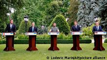 From left, Romanian President Klaus Iohannis, Prime Minister of Italy Mario Draghi, Ukraine President Volodymyr Zelenskyy, France's President Emmanuel Macron and German Chancellor Olaf Scholz attend a press conference in Kyiv, Thursday, June 16, 2022. The leaders of four European Union nations visited Ukraine on Thursday, vowing to back Kyiv's bid to become an official candidate to join the bloc in a high-profile show of support for the country fending off a Russian invasion. (Ludovic Marin, Pool via AP)