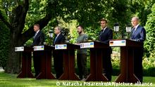 From left, Romanian President Klaus Iohannis, Prime Minister of Italy Mario Draghi, Ukraine President Volodymyr Zelenskyy, France's President Emmanuel Macron and German Chancellor Olaf Scholz attend a conference at the Mariyinsky palace in Kyiv, Ukraine, Thursday, June 16, 2022. (AP Photo/Natacha Pisarenko)