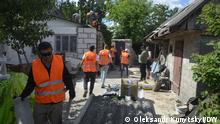  16 June, Kyiv region, volunteers from Dobrobat are repairing a house in the village of Mykulchi.