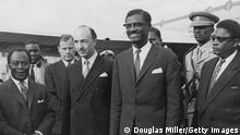 Patrice Lumumba (1925 - 1961), Prime Minister of the Republic of the Congo, is met by British statesman John Profumo (to left of centre) upon his arrival at London Airport, en route to the United Nations in New York, 23rd July 1960. (Photo by Douglas Miller/Keystone/Hulton Archive/Getty Images)