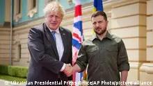 In this image provided by the Ukrainian Presidential Press Office, Ukrainian President Volodymyr Zelenskyy, right, and Britain's Prime Minister Boris Johnson, pose for a photo during their meeting in downtown Kyiv, Ukraine, Friday, June 17, 2022. (Ukrainian Presidential Press Office via AP)