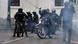 Riot police disperse demonstrators with tear gas during indigenous-led protests in Quito Riot police disperse demonstrators with tear gas during indigenous-led protests in Quito