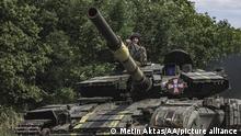 KHARKIV, UKRAINE - JUNE 18: A Ukrainian tank moves as Russian troops continue their brutal assaults on the Donbas, strengthening their group in the Kharkiv region, Ukraine on June 18, 2022. Metin Aktas / Anadolu Agency
