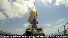 FILE - In this frame grab provided by Russian Defense Ministry press service, a long-range Kalibr cruise missile is launched by a Russian Navy ship in the eastern Mediterranean, Friday, Aug. 19, 2016. The Russian invasion of Ukraine is the largest conflict that Europe has seen since World War II, with Russia conducting a multi-pronged offensive across the country. The Russian military has pummeled wide areas in Ukraine with air strikes and has conducted massive rocket and artillery bombardment resulting in massive casualties. (Russian Defense Ministry Press Service photo via AP, File)