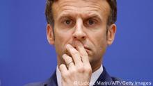 TOPSHOT - France's President Emmanuel Macron looks on prior to the start of the European Union (EU) summit at the EU Headquarters, one day to the month of Russia's invasion of the Ukraine, in Brussels on March 24, 2022. - France currently holds the Presidency of the Council of the European Union. (Photo by Ludovic MARIN / AFP) (Photo by LUDOVIC MARIN/AFP via Getty Images)