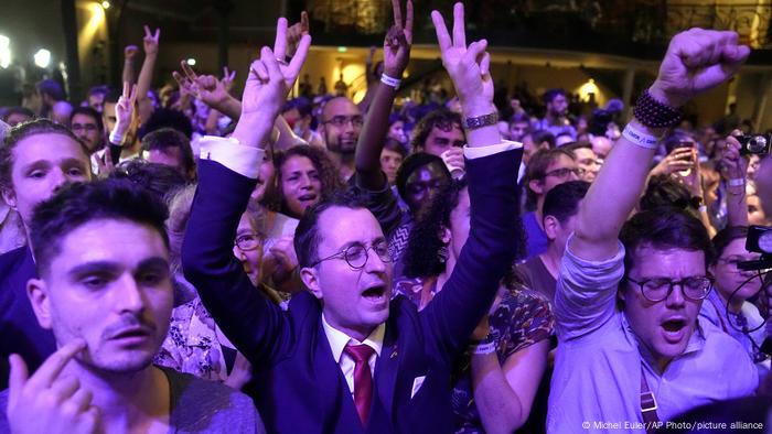 Supporters of hard-left leader Jean-Luc Melenchon at his election headquarters on June 19, 2022