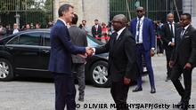 Belgiums Prime Minister Alexander De Croo (L) greets Democratic Republic of Congo's Prime Minister Jean-Michel Sama Lukonde ahead of a ceremony to hand over a tooth of Democratic Republic of Congo's first prime minister and independence hero Patrice Lumumba at the Egmont Palace in Brussels, on June 20, 2022. - Former colonial master Belgium hosted an official ceremony to return the slain Congolese leader's tooth -- all that is left of the anti-colonialist icon who was murdered by Congolese separatists and Belgian mercenaries in 1961. (Photo by Olivier Matthys / POOL / AFP) (Photo by OLIVIER MATTHYS/POOL/AFP via Getty Images)