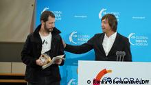 DW Freedom of Speech Award 2022 winners Mstyslav Chernov (left) and his colleague Evgeniy Maloletka (right) during the official Award ceremony at GMF 2022.