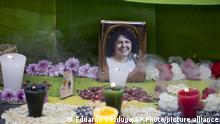 FILE - This June 15, 2016, file photo shows a framed image of environmentalist Berta Caceres on a makeshift altar made in her honor during a demonstration outside Honduras' embassy, in Mexico City. At least 200 land and environmental defenders were slain protecting forests, rivers and lands from mining, logging and agricultural companies in 2016 in the world’s deadliest recorded year for such activists, a watchdog group said Thursday, July 13, 2017. That included the high-profile murder of Caceres, who was awarded the prestigious Goldman Environmental Prize for her opposition to a hydroelectric project on her Lenca people’s lands in Honduras. (AP Photo/Eduardo Verdugo, File) |