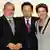 Südkoreas Präsident Lee Myung-bak umarmt Brasiliens Präsident Luiz Inácio Lula da Silva und dessen Nachfolgerin Dilma Rousseff (Foto: ap)