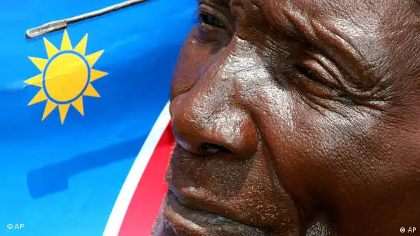 Face in front of Namibian flag