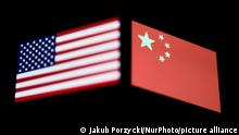 Flags of United States and China displayed on phone screens are seen in this multiple exposure illustration photo taken in Krakow, Poland on May 15, 2022. (Photo illustration by Jakub Porzycki/NurPhoto)