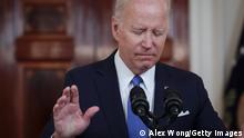 US president Joe Biden raises his hand while commenting on the Supreme Court’s decision