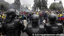 QUITO, ECUADOR - JUNE 24: Protesters in front of the riot police, during the 12th day of the national strike, in Parque El Arbolito, in Quito, on June 24, 2022. Ana Vega / Anadolu Agency