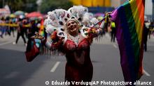 A participant takes part in the annual Pride march in Mexico City, Saturday, June 25, 2022. (AP Photo/Eduardo Verdugo)