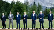 From left, Italy's Prime Minister Mario Draghi, Canada's Prime Minister Justin Trudeau, France's President Emmanuel Macron, Germany's Chancellor Olaf Scholz, US President Joe Biden, Britain's Prime Minister Boris Johnson and Japan's Prime Minister Fumio Kishida pose for a group photo at Castle Elmau in Kruen, near Garmisch-Partenkirchen, Germany, on Sunday, June 26, 2022. The Group of Seven leading economic powers are meeting in Germany for their annual gathering Sunday through Tuesday. (Brendan Smialowski/Pool via AP)