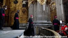 26/07/2020***
Catholic clergy walk inside the Metropolitan Cathedral, on the first day it reopened for public services amidst the ongoing coronavirus pandemic, in Mexico City, Sunday, July 26, 2020. (AP Photo/Rebecca Blackwell)