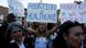 An abortion rights protester holds a sign as she demonstrates An abortion rights protester holds a sign as she demonstrates