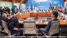June 27, 2022, Schloss Elmau, Germany: Prime Minister Justin Trudeau and British Prime Minister Boris Johnson chat prior to a meeting with Partner Countries and International Organizations at the G7 Summit in Schloss Elmau on Monday, June 27, 2022. (Credit Image: © Paul Chiasson/The Canadian Press via ZUMA Press