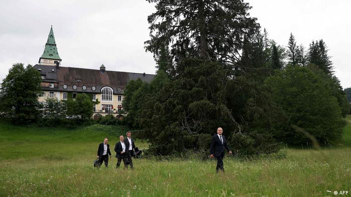 German Chancellor Olaf Scholz leaves the G7 Summit in Elmau 2022 